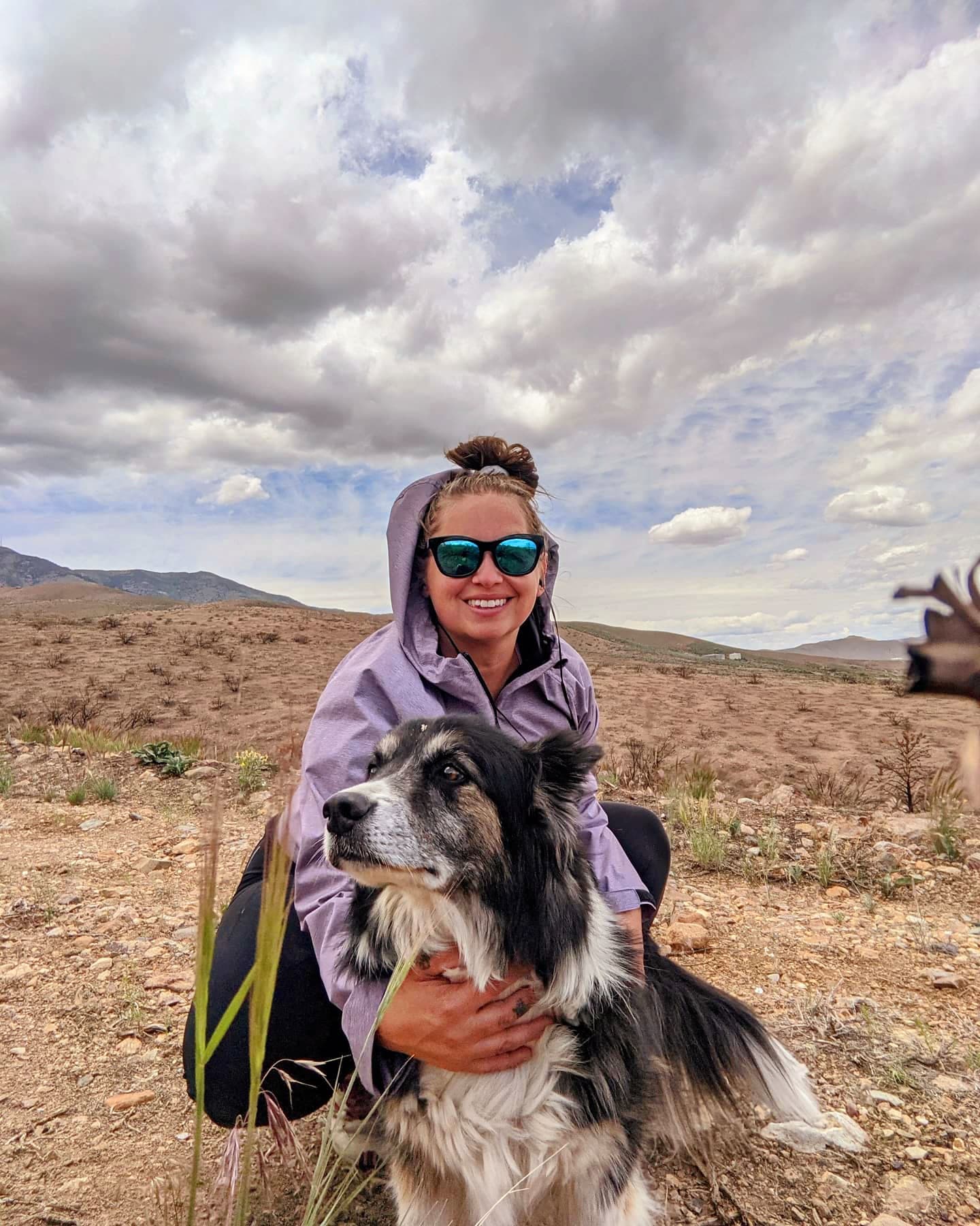 Kerri Lynn in the desert with her dog